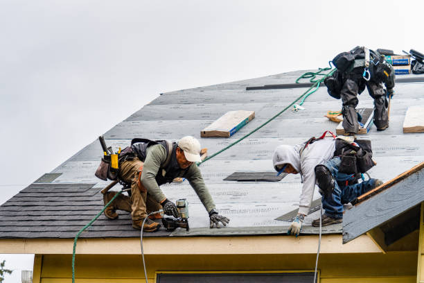 Professional Gutter Installation technician working in Junction City, KS